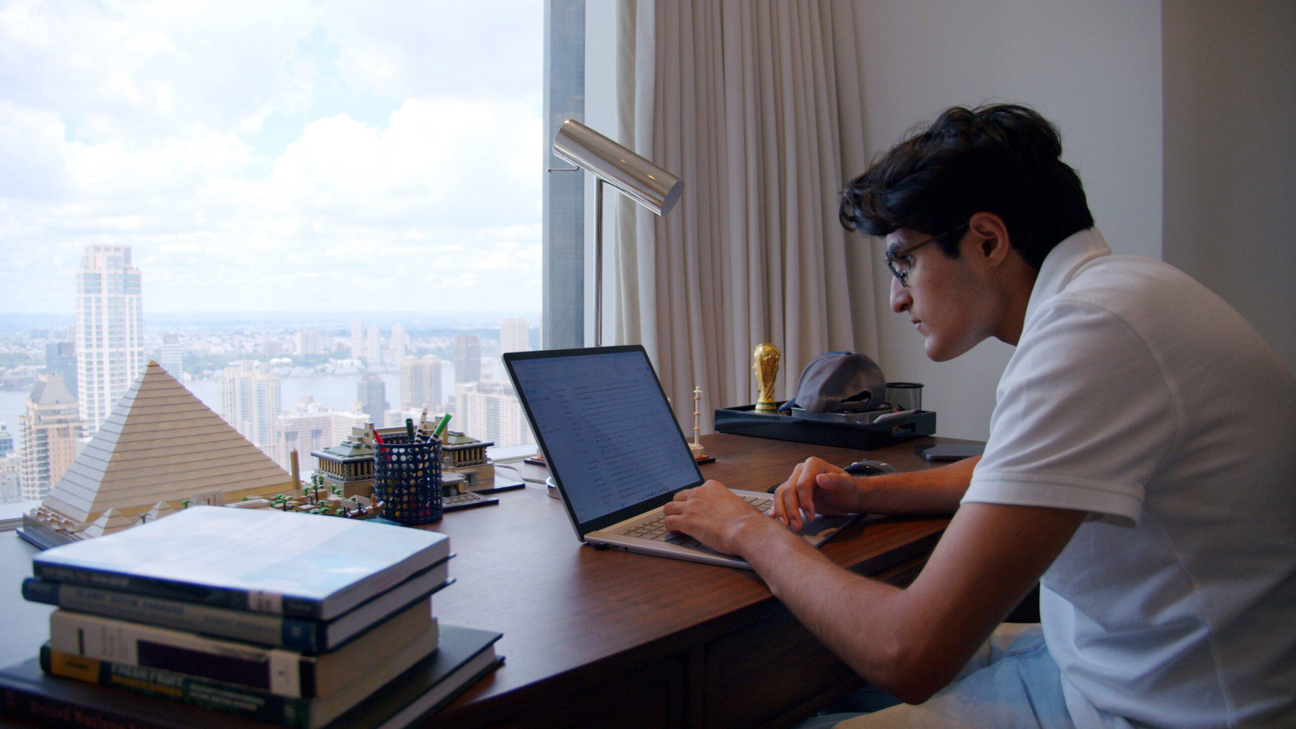 About Me - Zein at Desk